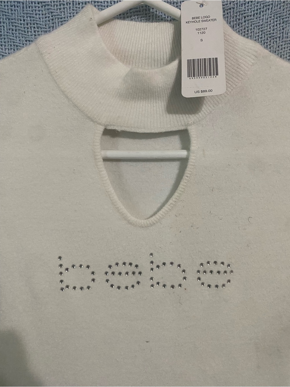 bebe White Keyhole Turtleneck Sweater with Crystal Logo